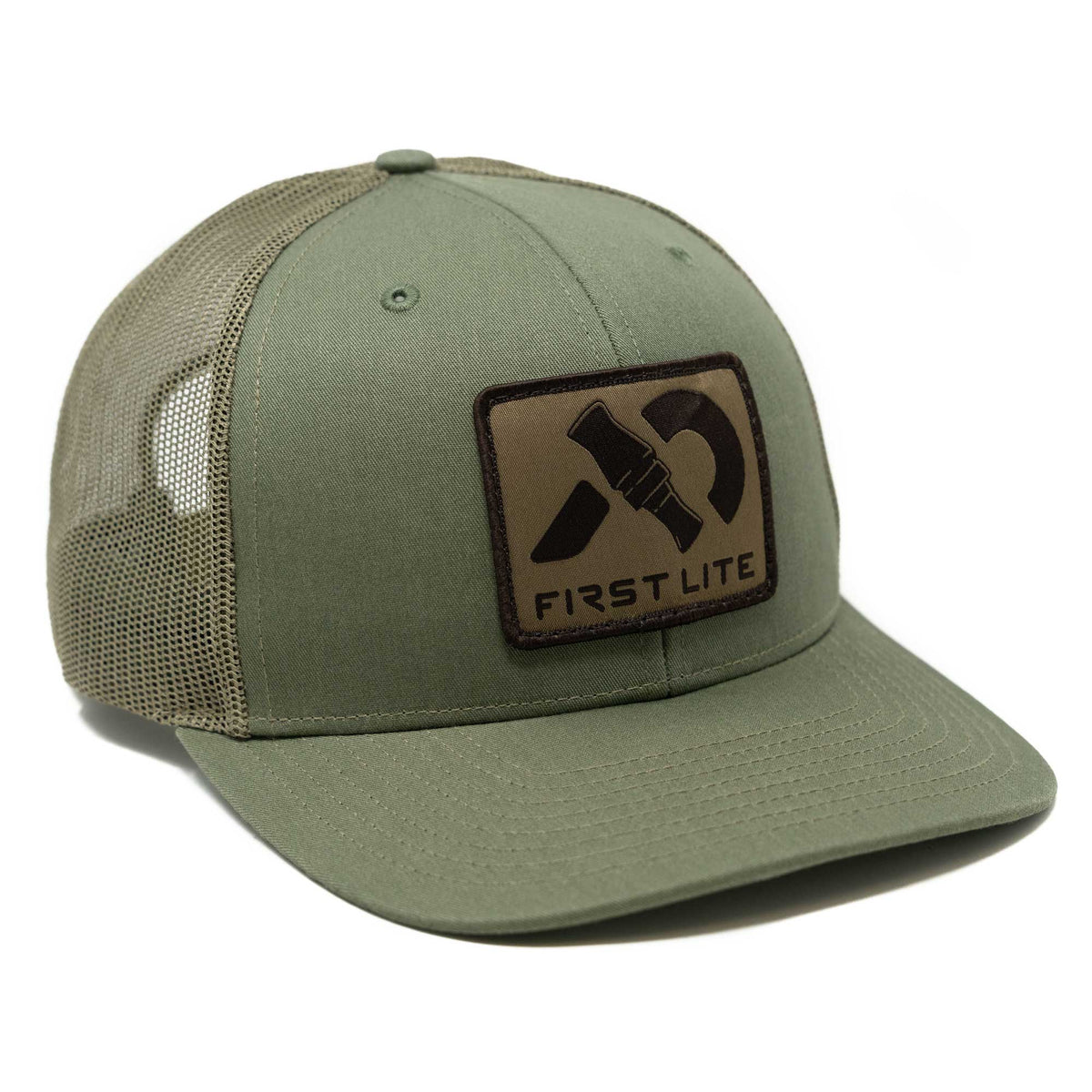 Olive green trucker hat featuring a dark brown rectangular patch on the front with a black stylized duck call graphic and "FIRST LITE" text.