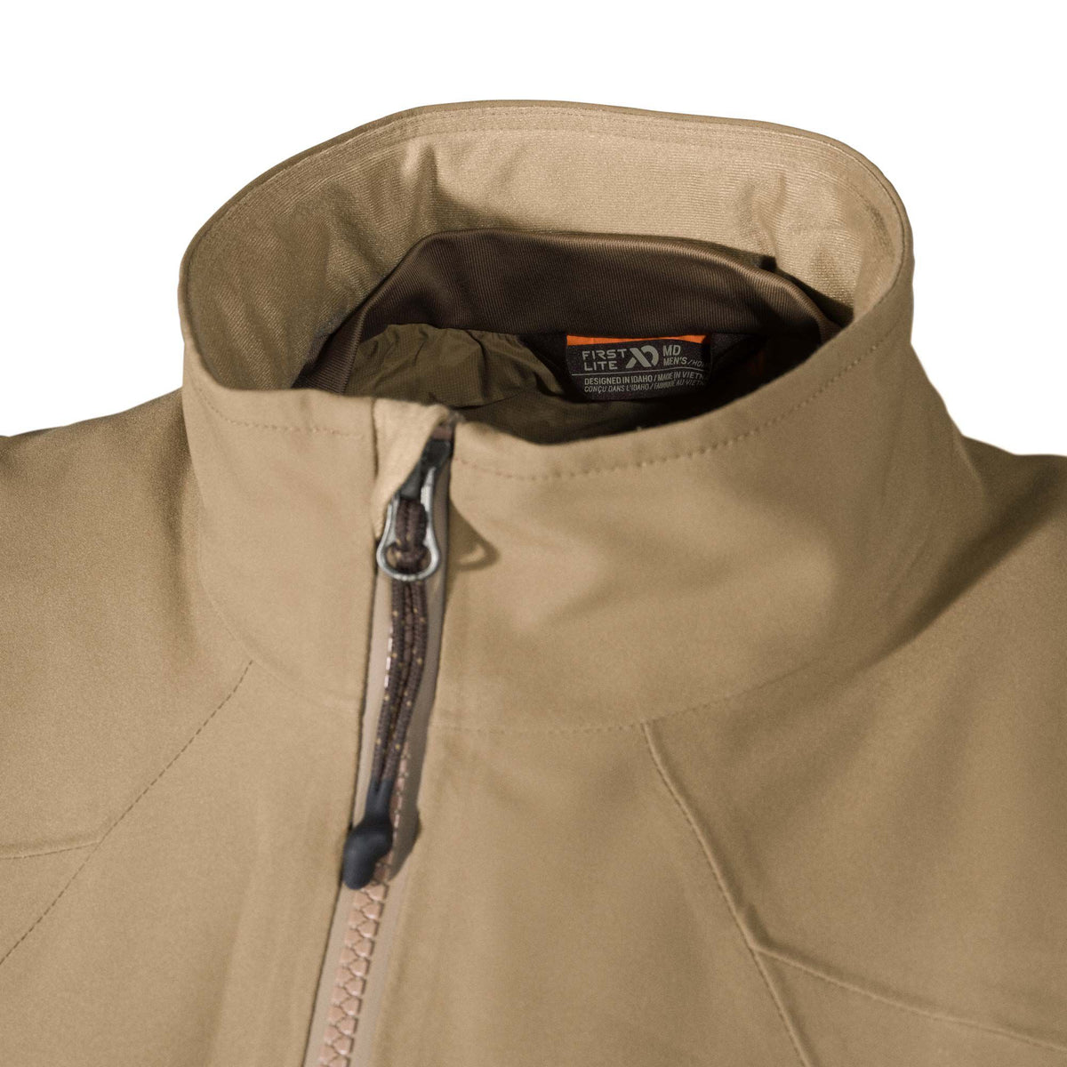 Tan men's First Lite jacket with a high collar, brown front zipper, and internal brand tag.
