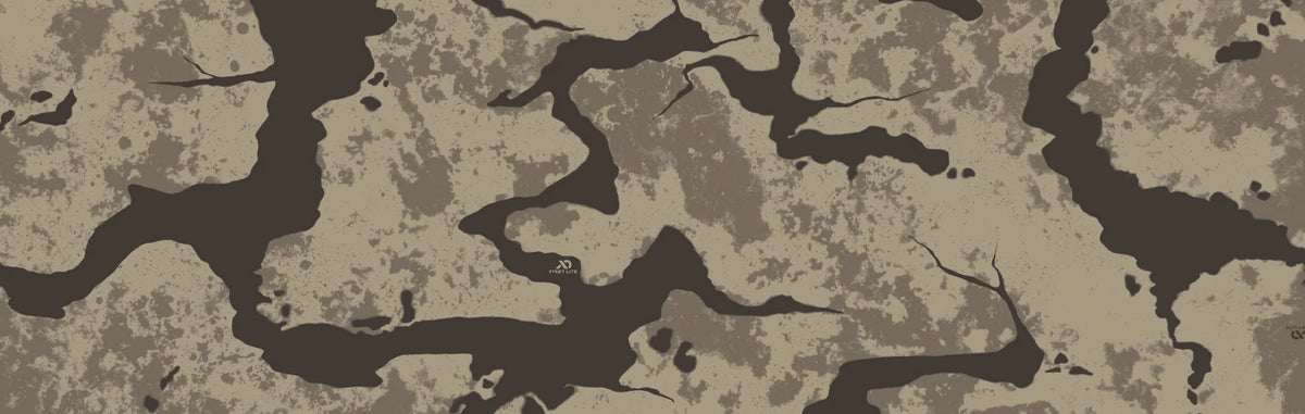 First Lite cracked earth camouflage pattern in brown and tan colors.