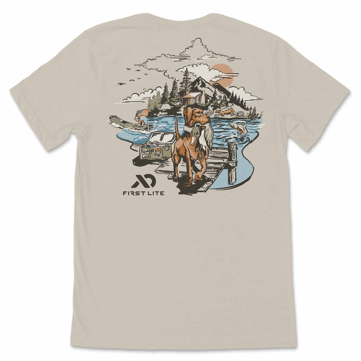 Beige t-shirt featuring a detailed First Lite graphic on the back depicting a retriever dog holding a duck on a dock by a lake, with mountains, a cabin, and a sunset.