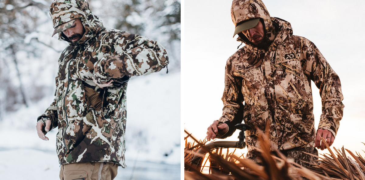 Multi-terrain camo hooded hunting jacket with thumb loops and a handwarmer pocket.