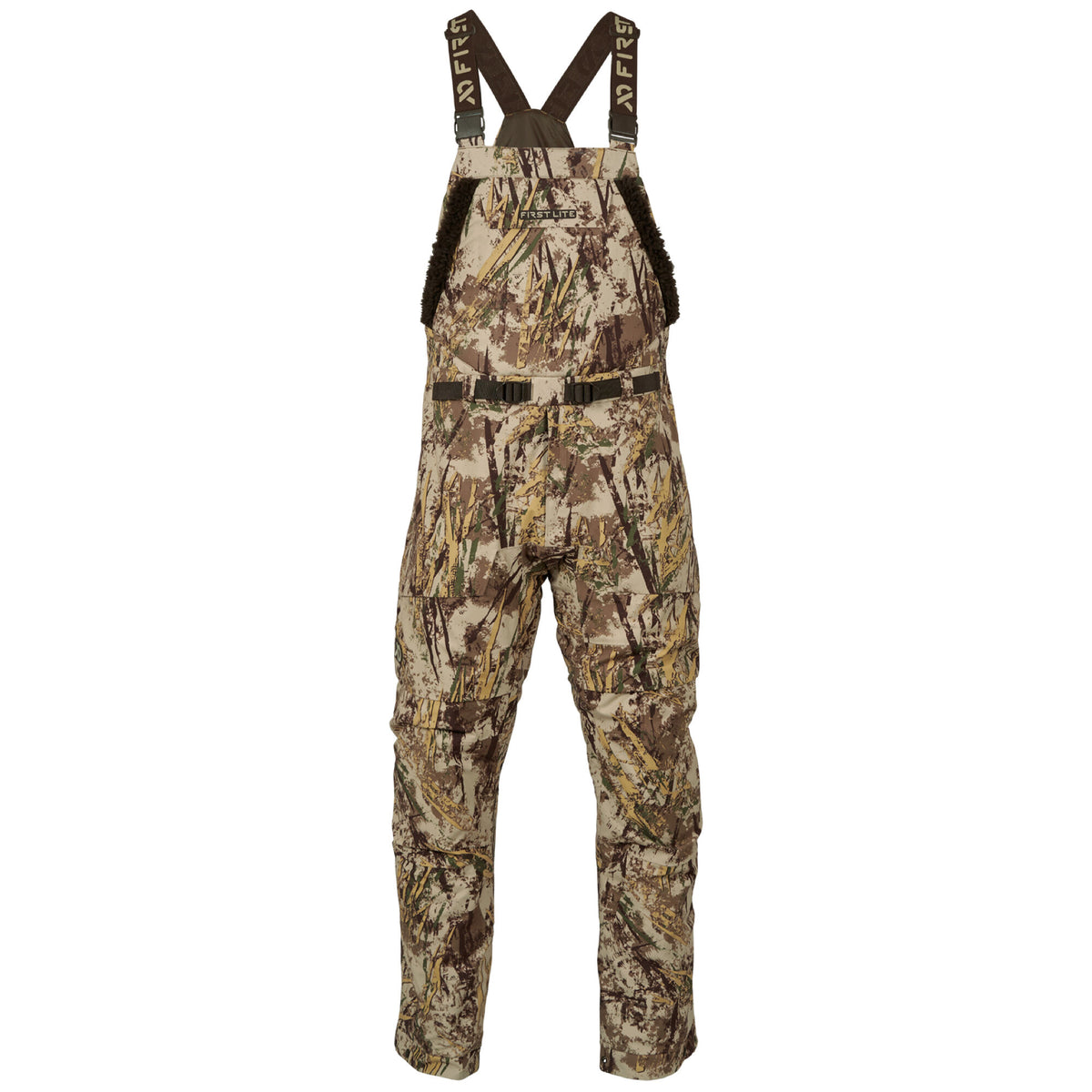 First Lite brown and tan camouflage hunting bibs with adjustable suspenders and brown fleece chest panels.