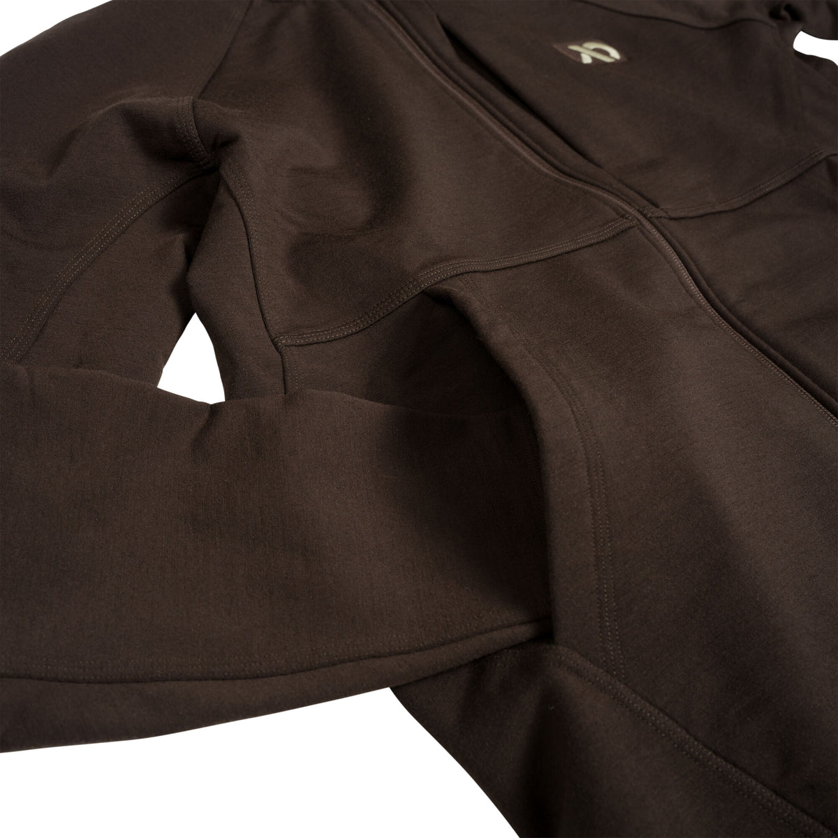 Dark brown full-zip jacket with side pockets and a light-colored logo on the chest.