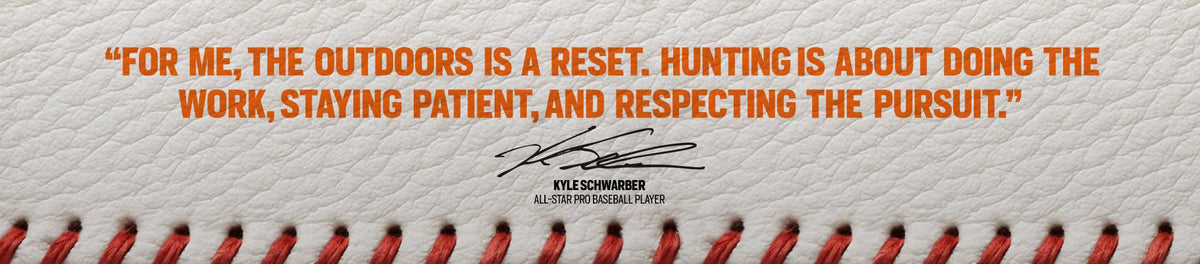 White textured baseball with orange quote by Kyle Schwarber, his signature & red stitches.
