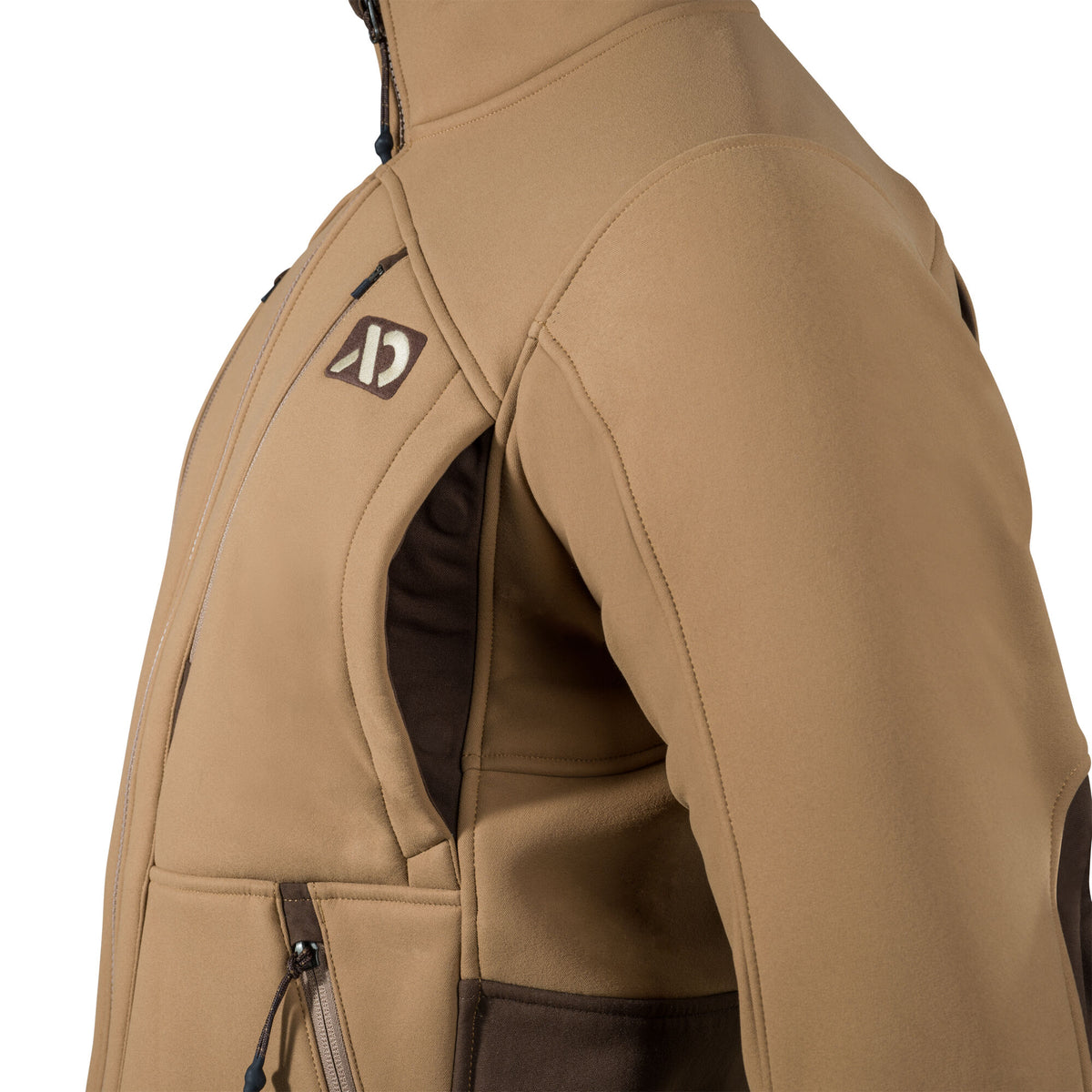 Tan jacket with dark brown accents, a stylized chest logo, open side pocket, and visible front zipper.