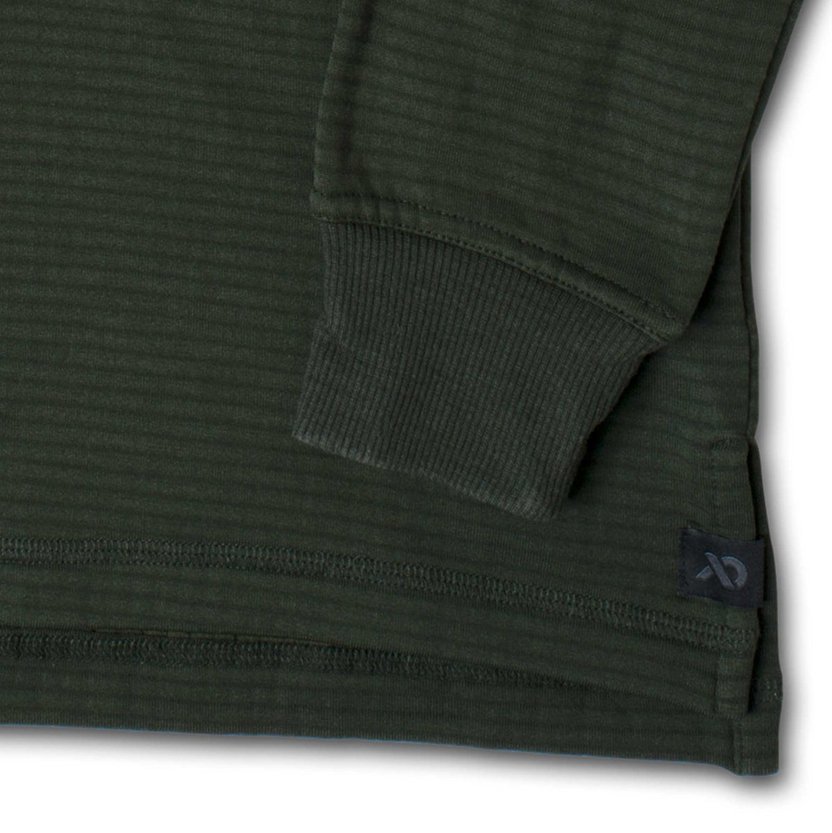 Dark green long-sleeved shirt with a horizontal ribbed texture, ribbed cuff, and black logo tag near the hem.