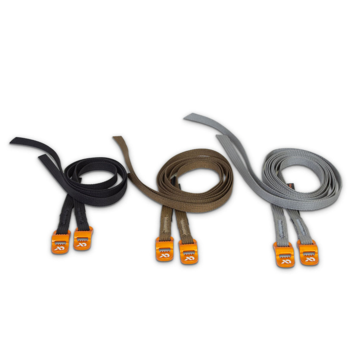 Three sets of coiled straps in black, brown, and grey, each with two bright orange buckles.