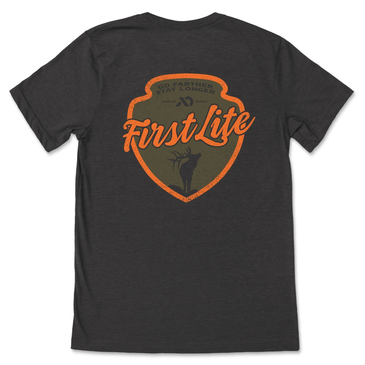 Dark gray heather T-Shirt featuring "FIRST LITE" in the center and "GO FARTHER STAY LONGER" with a deer below