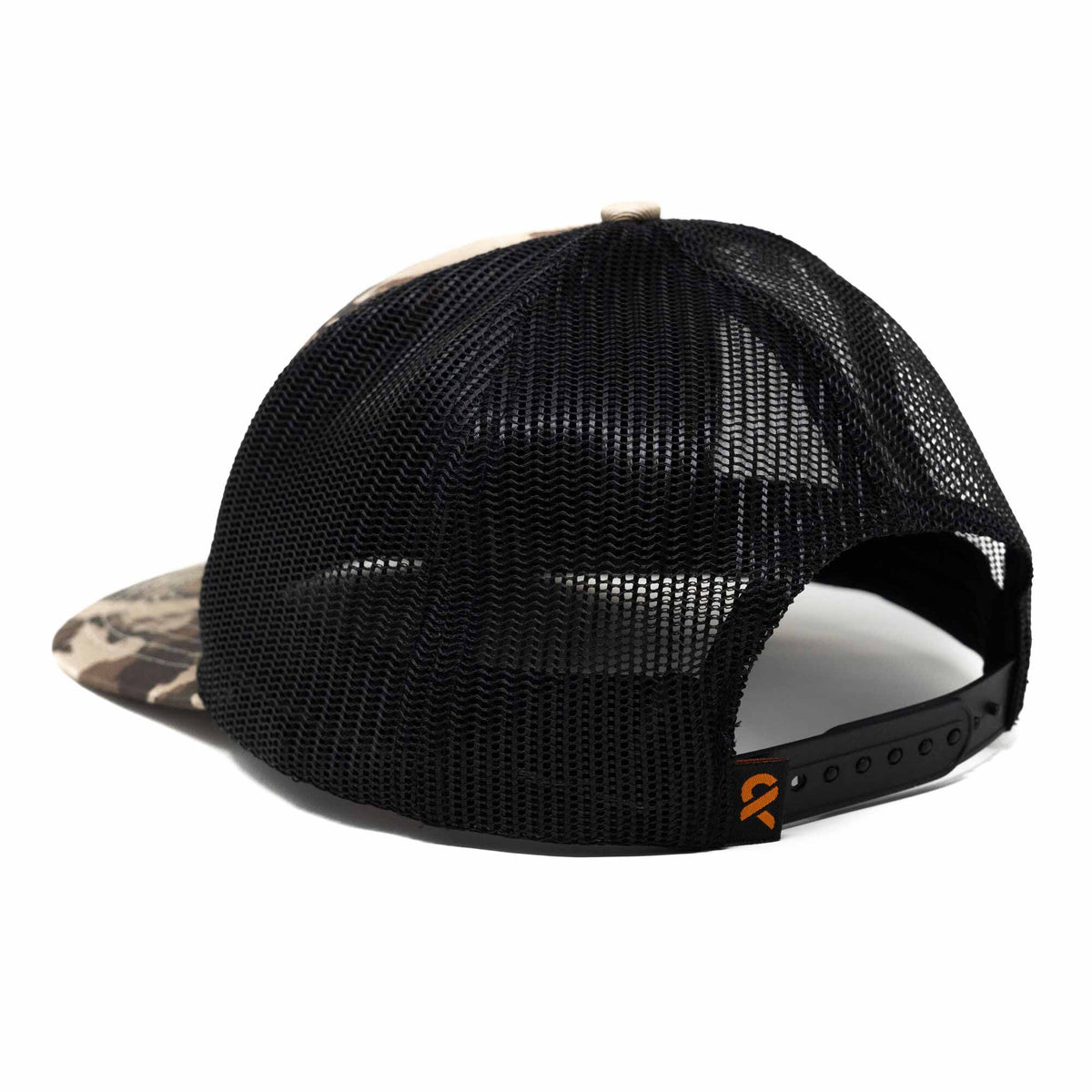 Camo trucker hat with black mesh back, snap closure, and orange logo tag.