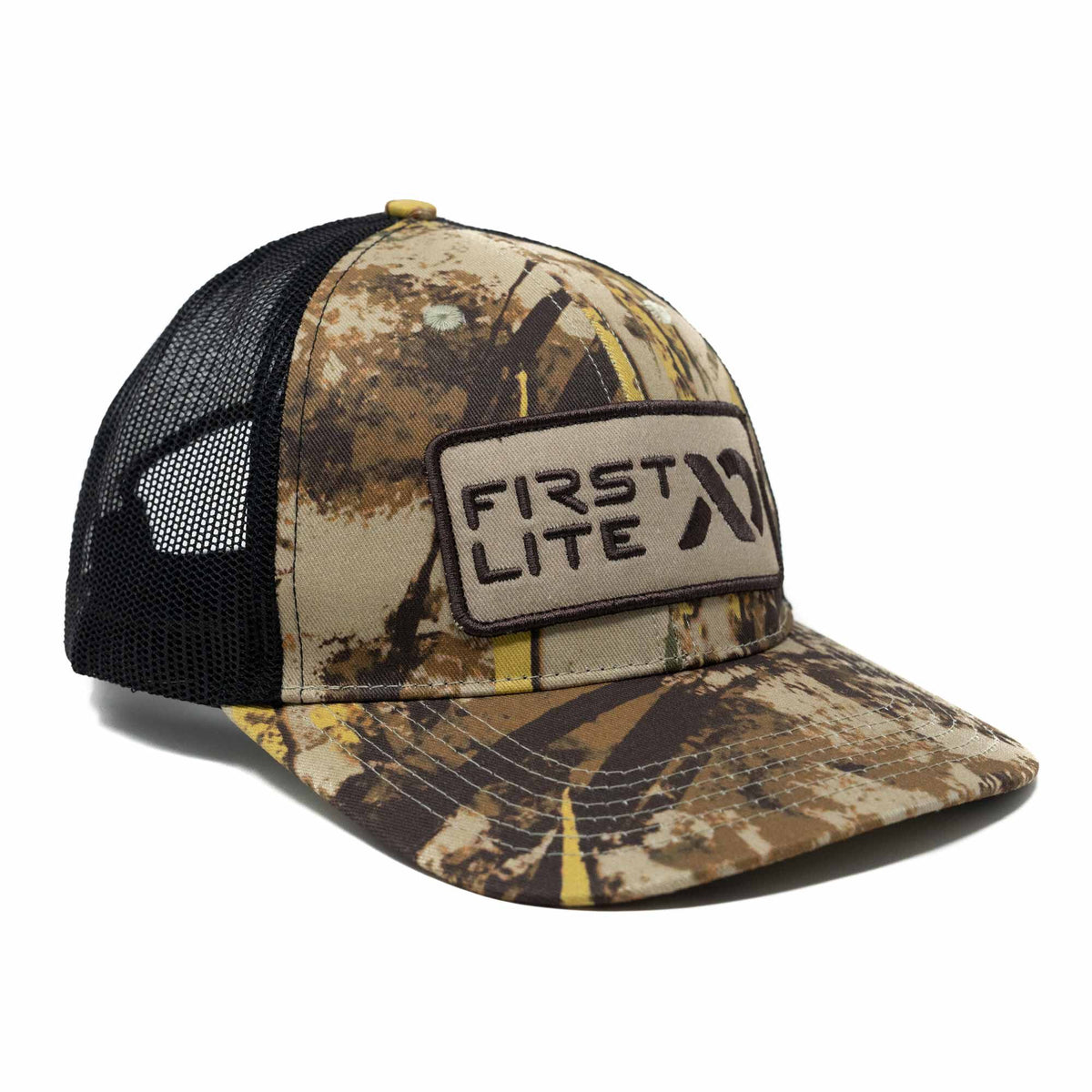 Camo trucker hat with black mesh back and a beige "FIRST LITE" logo patch on the front.