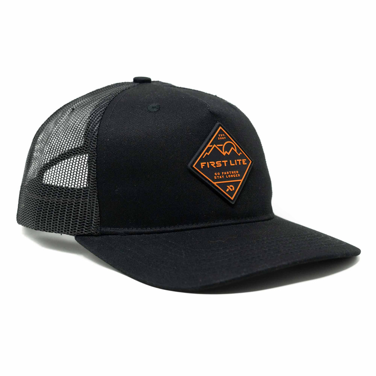 Black trucker hat with a mesh back and a front diamond patch featuring orange 'FIRST LITE' text and mountain design.