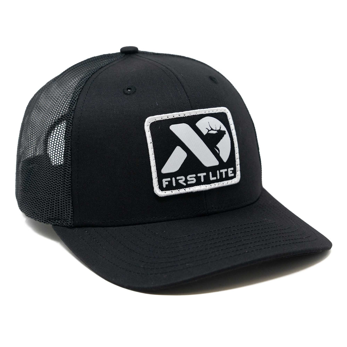Black trucker hat with mesh back and white "FIRST LITE" logo patch featuring a stylized deer.