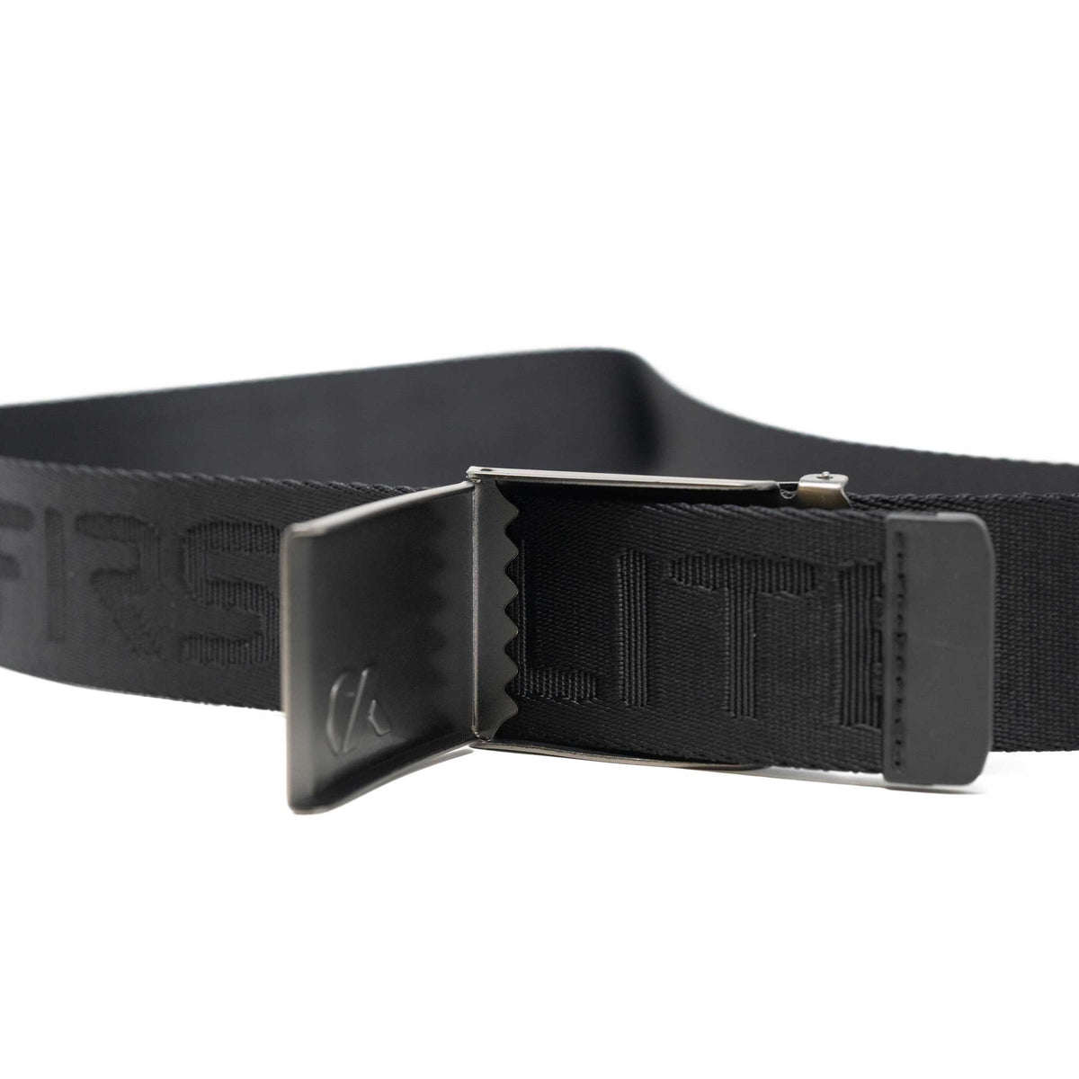 Black nylon belt with silver buckle and teeth with the First Lite logo.