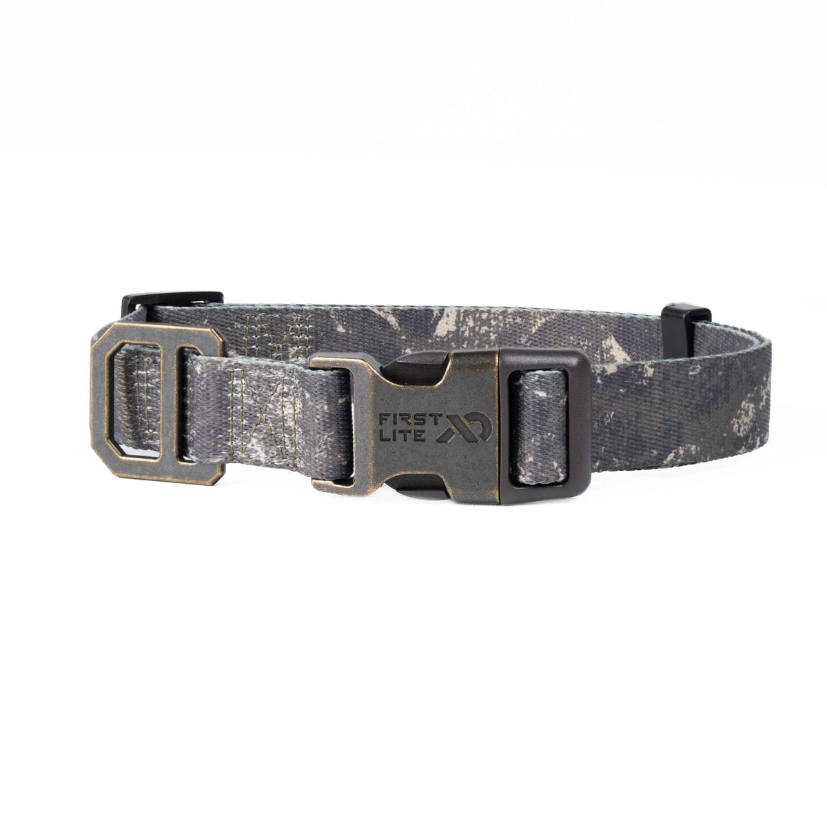A First Lite dog collar with a gray and black camouflage pattern, featuring a dark metal quick-release buckle and matching metal D-rings, shown against a plain white background.