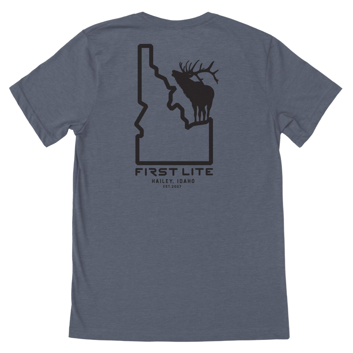 Slate gray t-shirt with a black graphic on the back featuring the Idaho outline, an elk silhouette, and "FIRST LITE HAILEY, IDAHO EST. 2007" text