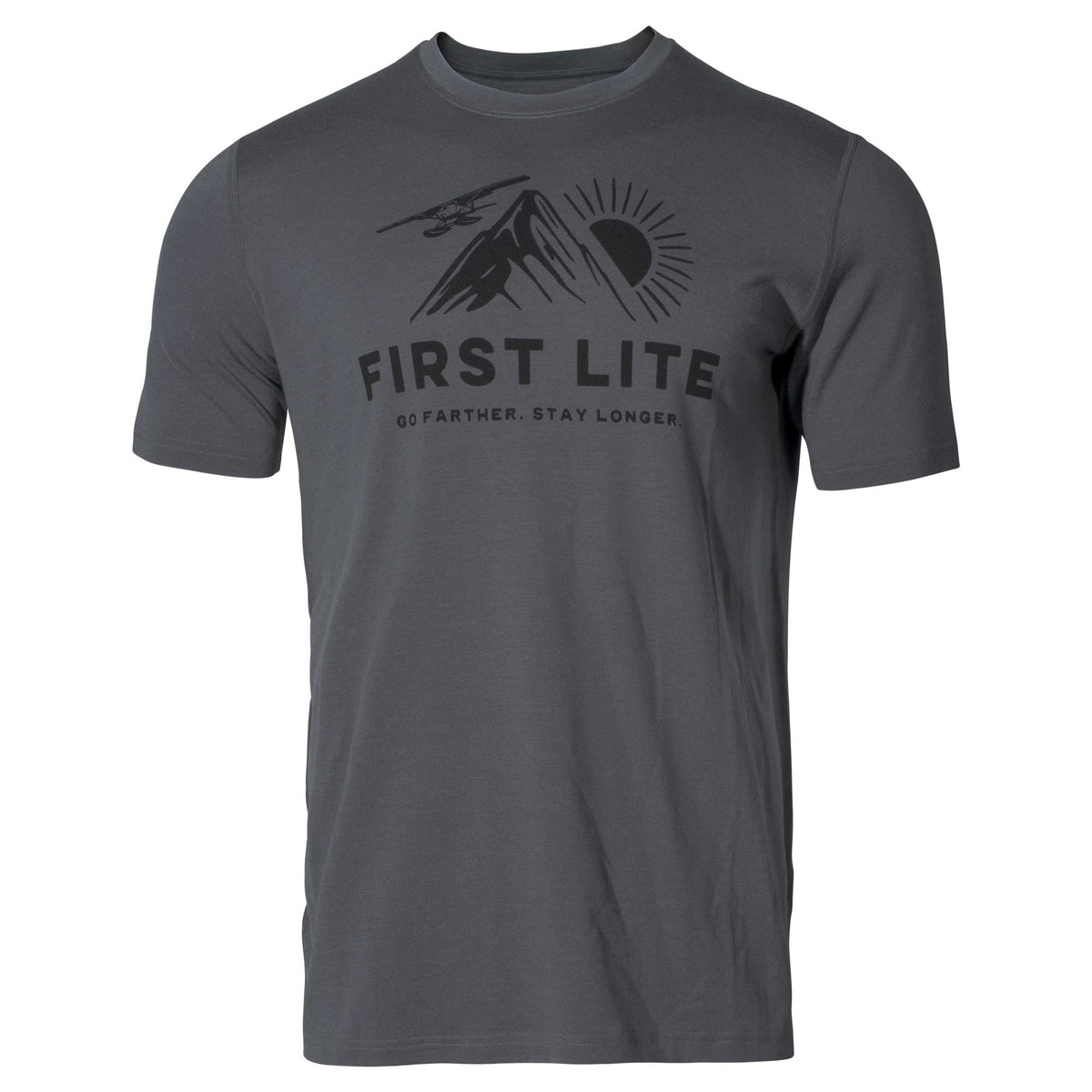 Charcoal grey t-shirt featuring a black graphic of a mountain, sun, airplane, and 'FIRST LITE GO FARTHER. STAY LONGER.' text.
