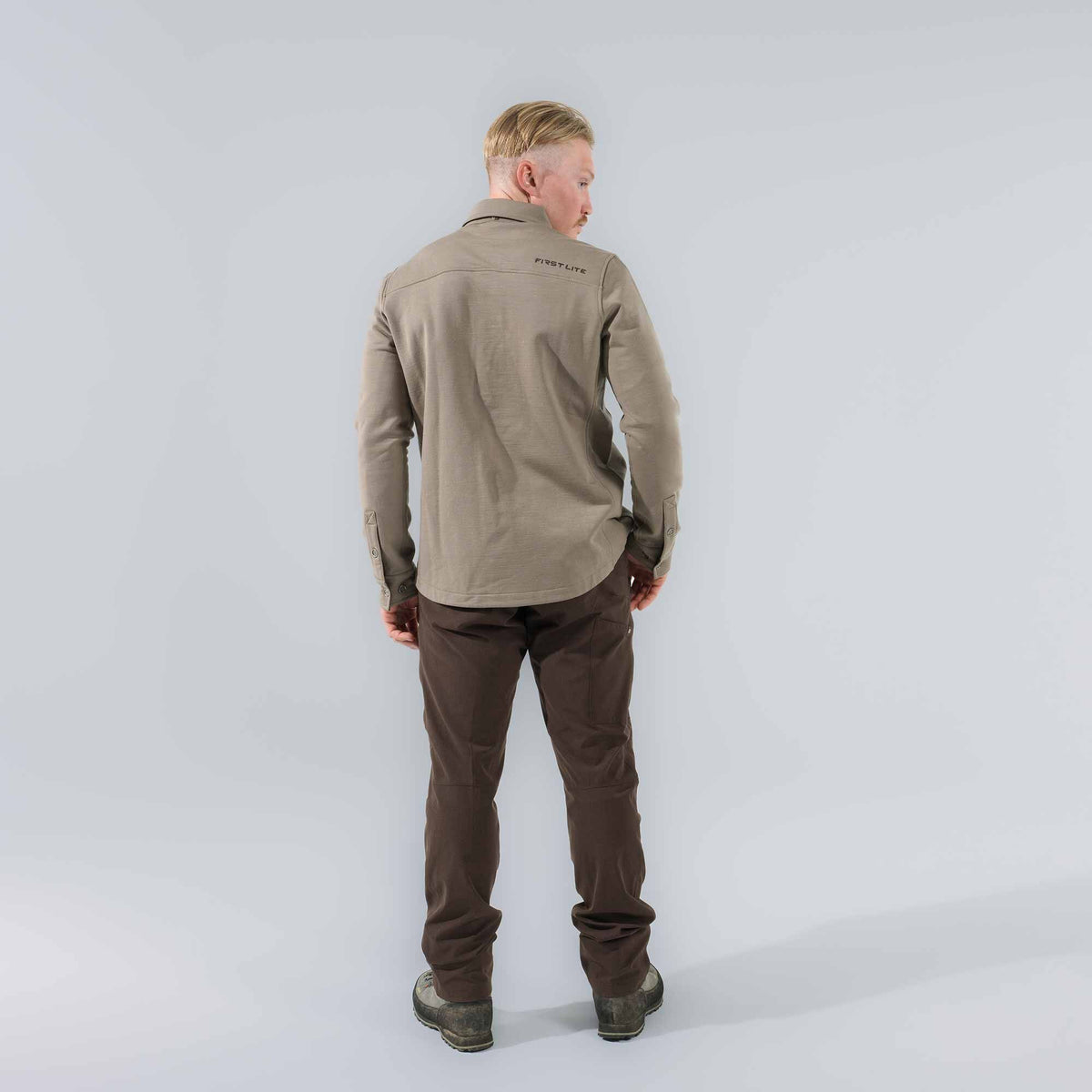 Tan collared long-sleeve shirt with "FIRST LITE" logo on the back.