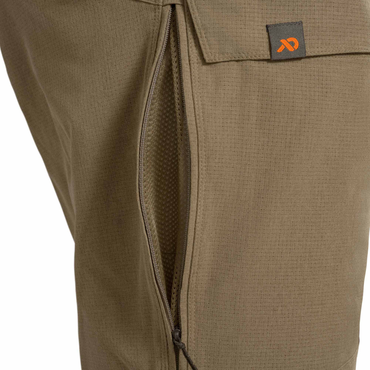 Olive green ripstop pants with a partially unzipped side pocket revealing a mesh lining and a brand logo on an upper flap.