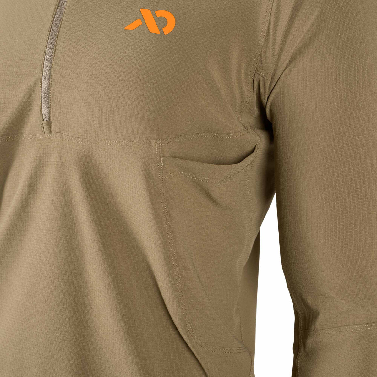 Khaki long-sleeve quarter-zip shirt with an orange logo and a small open pocket.