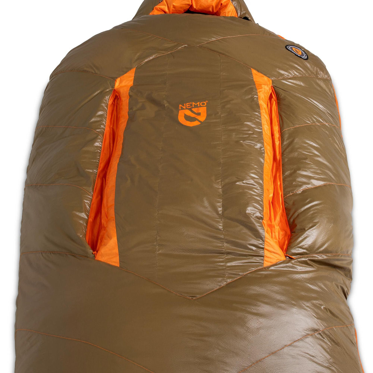 Brown Nemo sleeping bag with a prominent orange logo, bright orange internal details, and quilted baffling.