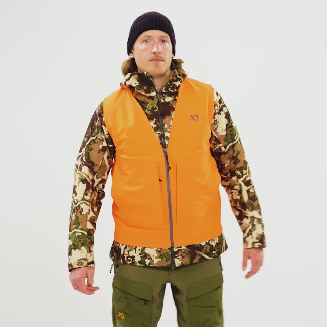 Video of a man walking on wearing the Charge Hunters Orange Vest, displaying its features.
