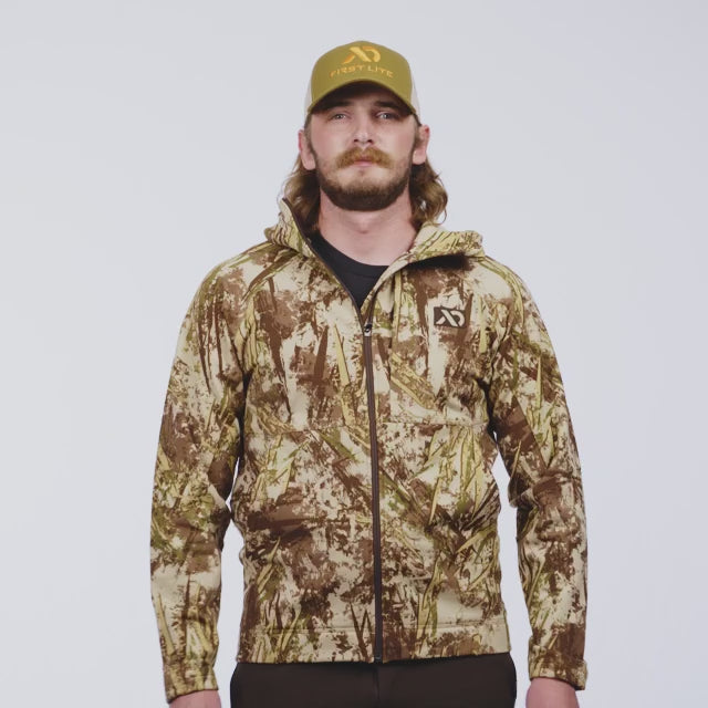 Video of a man walking on wearing the Rugged Wool Zip Hoody, displaying its features.