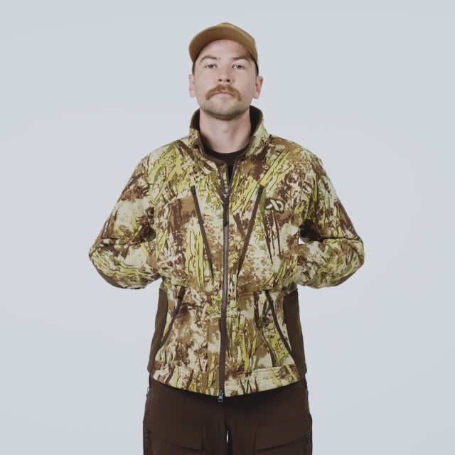 Video of a man walking on wearing the Straightline Field Jacket, displaying its features.
