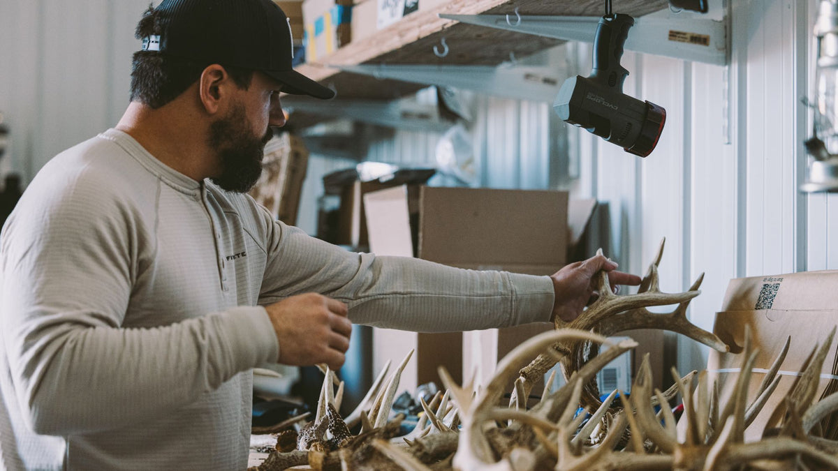 Kyle Schwarber Looks at Whitetail Shed Antlers