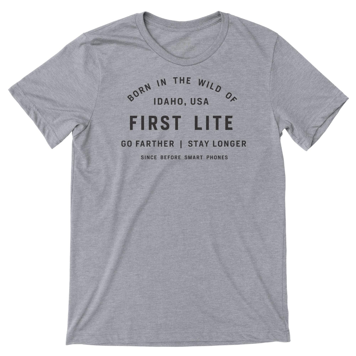 Gray t-shirt featuring black text graphic "Born in the Wild of Idaho, USA First Lite Go Farther | Stay Longer Since Before Smart Phones".