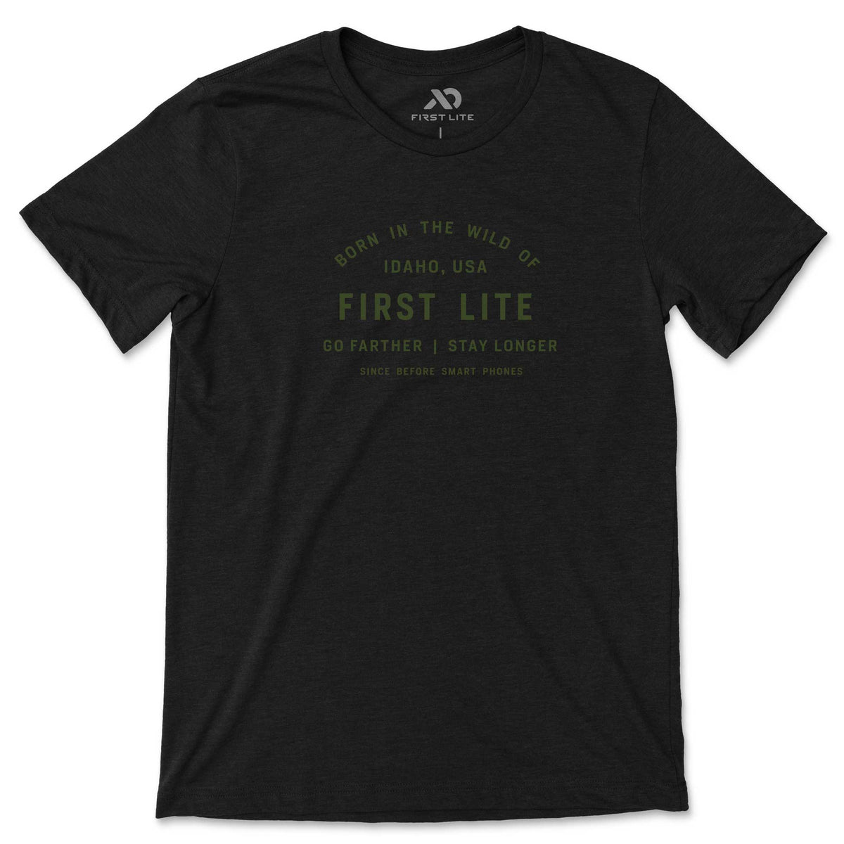 Heather black t-shirt featuring olive green "FIRST LITE" branding and "BORN IN THE WILD OF IDAHO, USA" text on the chest.