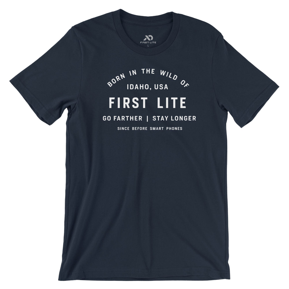 Navy t-shirt featuring white text graphic "Born in the Wild of Idaho, USA First Lite Go Farther | Stay Longer Since Before Smart Phones".
