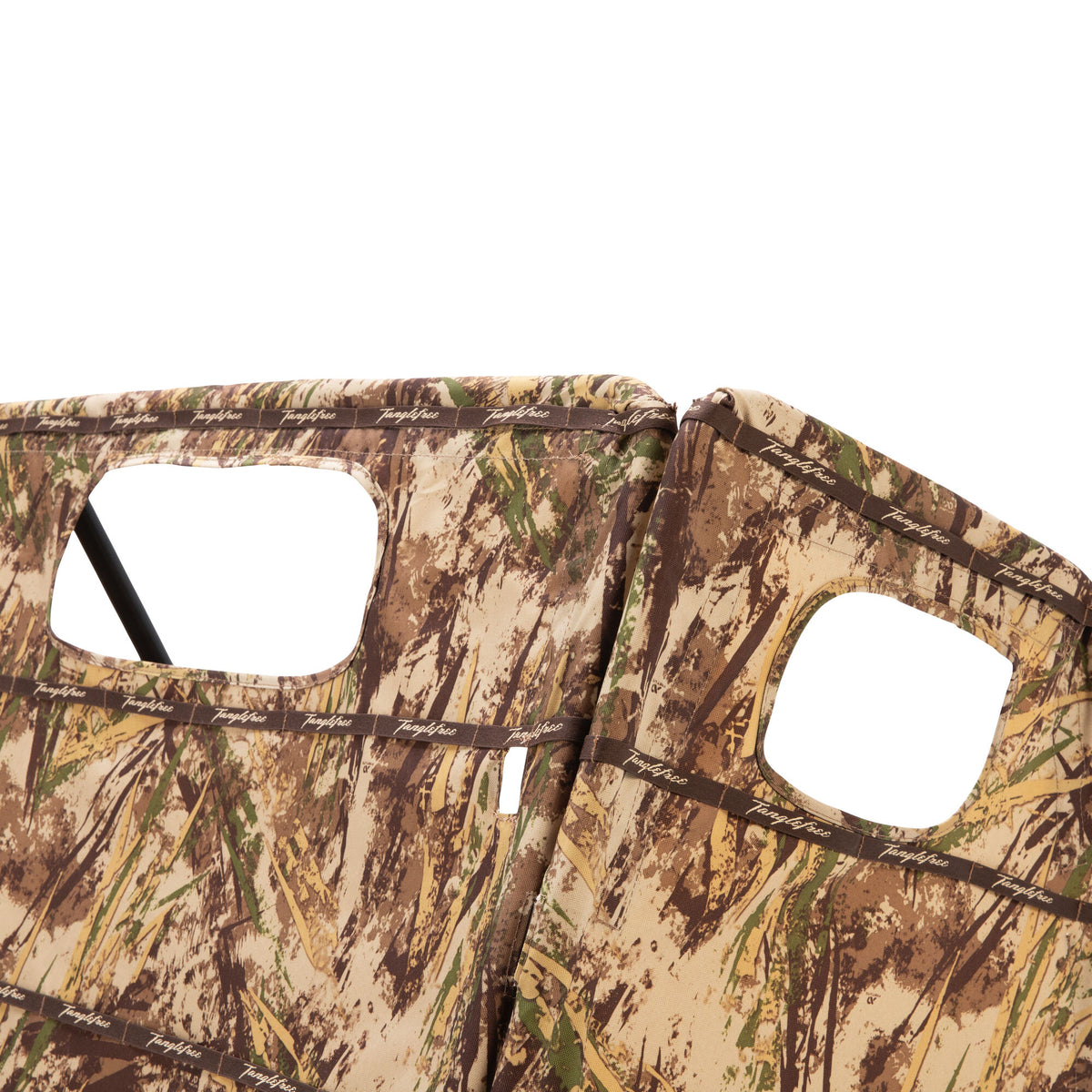 Camouflage hunting blind in a brown, green, and tan reeds pattern, featuring two rectangular open windows and "Tanglefree" branded straps.