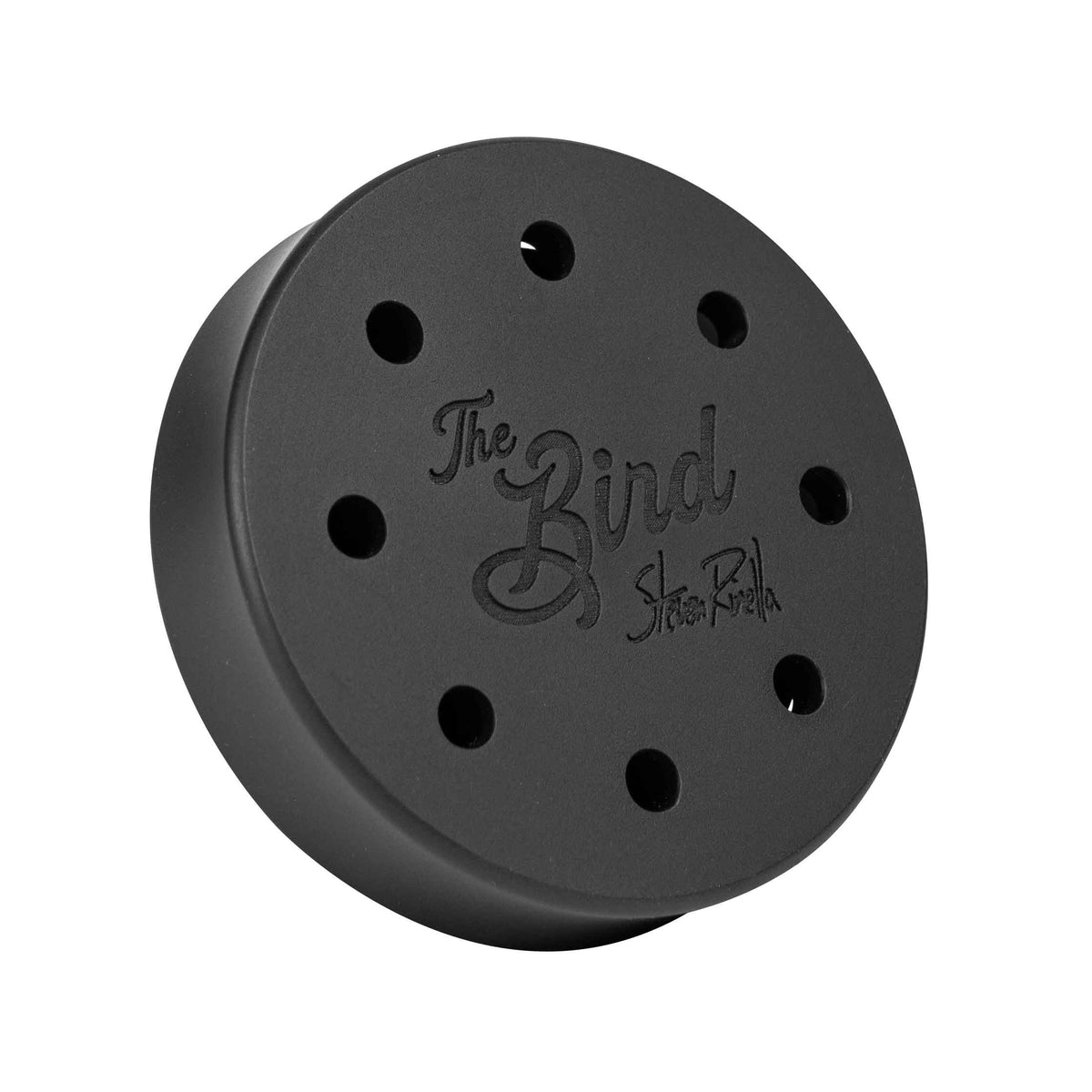 Matte black circular disc with eight small holes and embossed text 'The Bird Steven Rinella'.