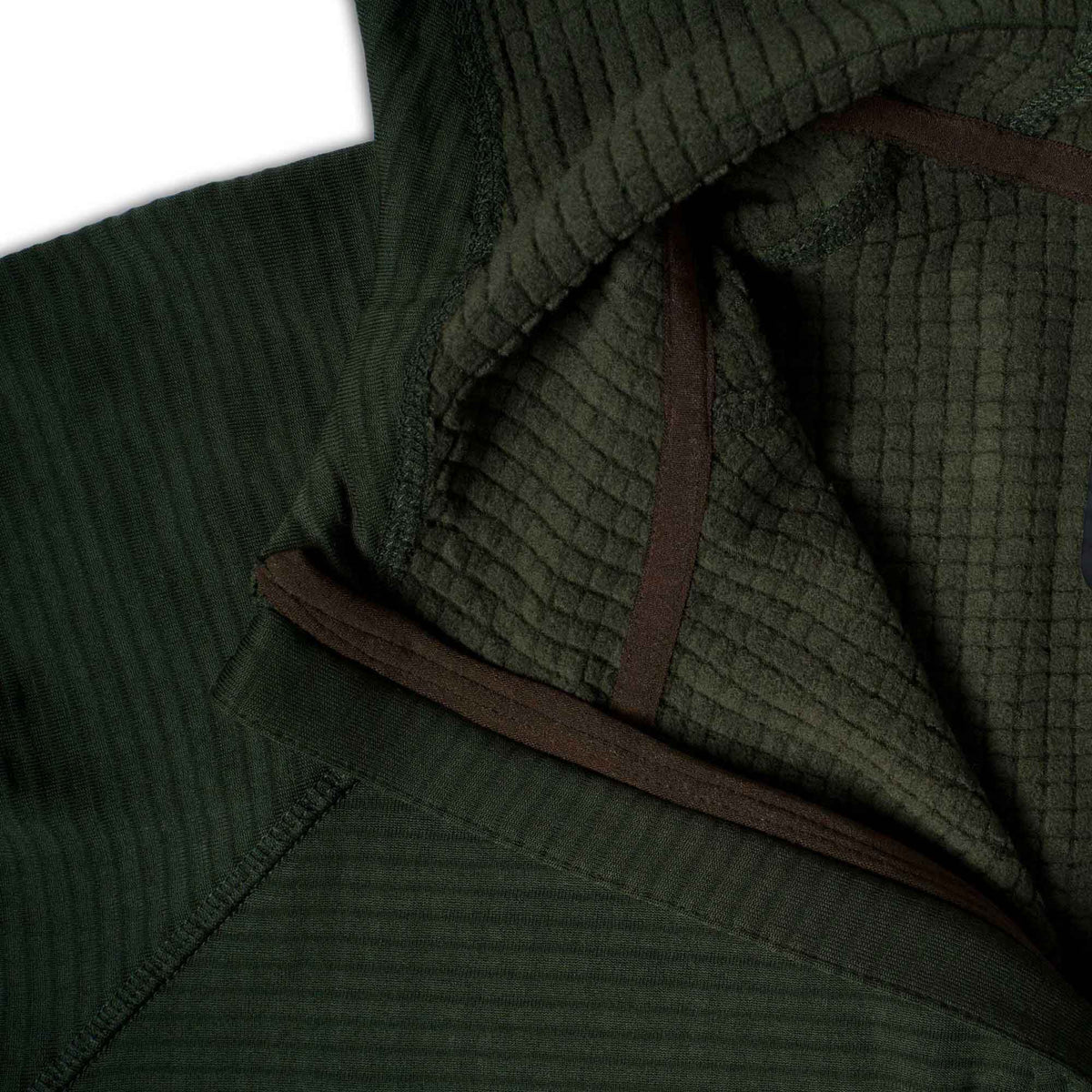 Dark green top with fine ribbed exterior, waffle-knit interior, and brown trim.