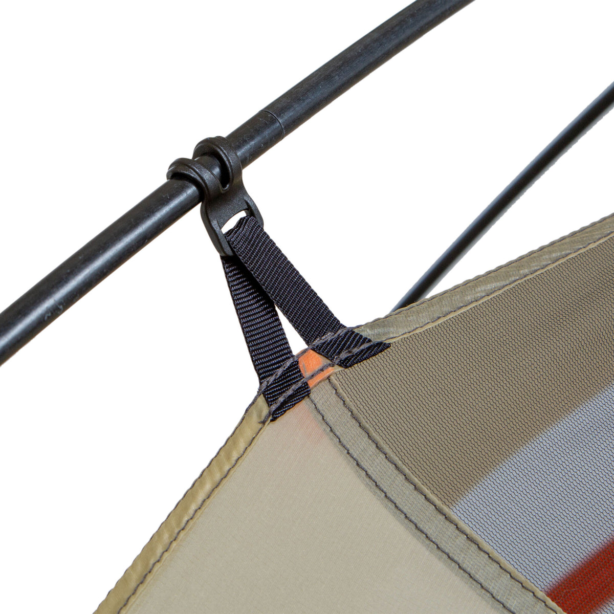 Close-up of a black clip and webbing attaching olive green, white mesh, and orange tent fabric to a black pole.