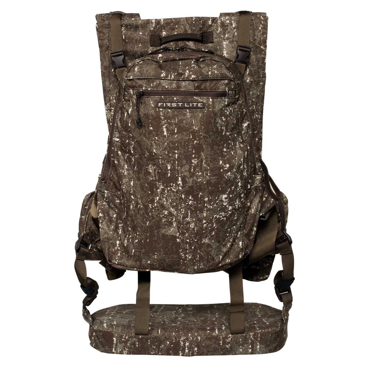 Brown and green camouflage First Lite hunting pack with a front zippered pocket, top handle, and padded foldable seat.